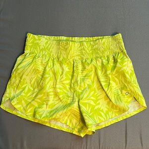 Gap Fit neon yellow/green running shorts w/ palm leaf pattern